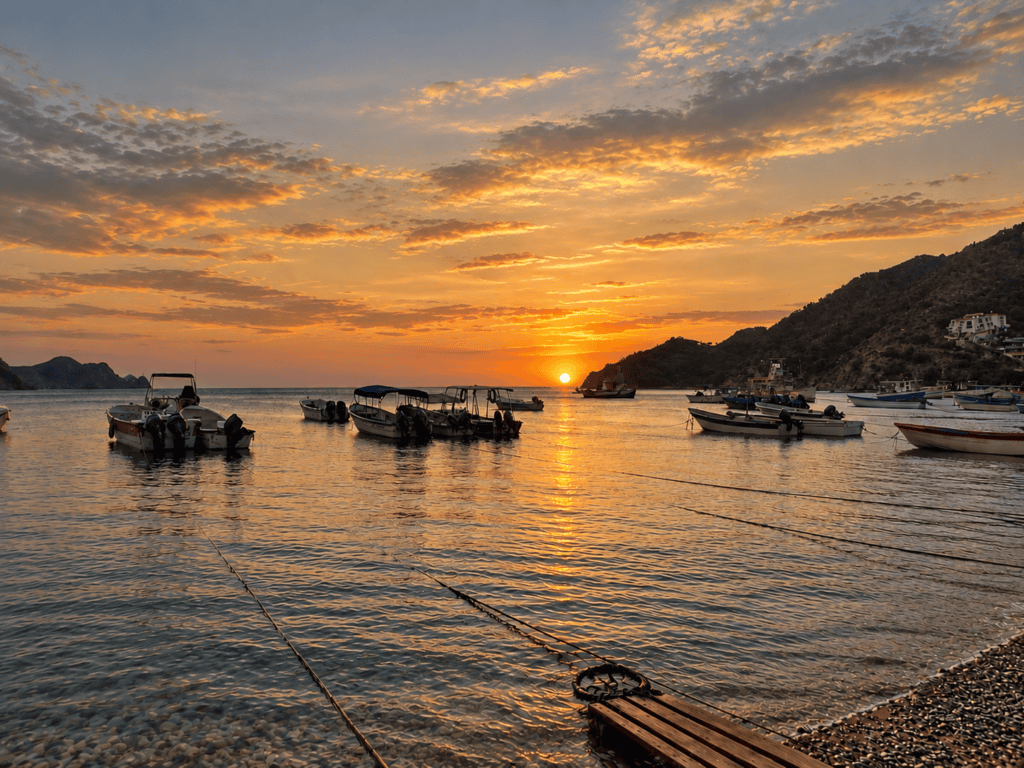 Sunset over Taganga Bay after a day trip to Minca from Divanga